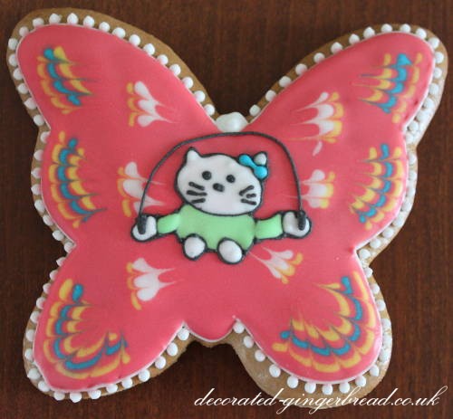 Gingerbread butterfly cookie with Hello Kitty