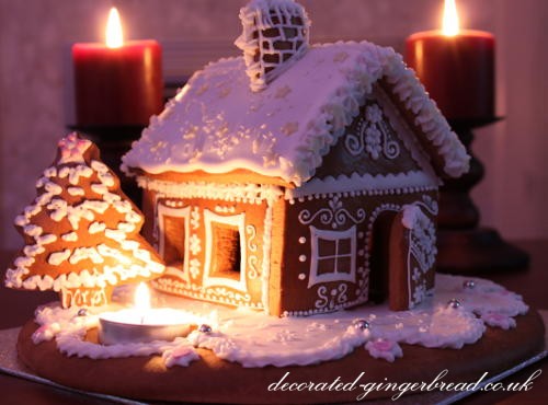 Christmas gingerbread house with candle