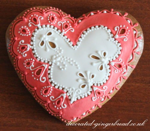 Decorated Gingerbread heart with royal icing patterns